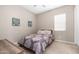Guest bedroom featuring carpet, standard size bed, and neutral colors at 4323 E Wheaton St, Gilbert, AZ 85295