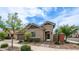 Charming single-story home featuring a well-maintained front yard and inviting covered entry at 4323 E Wheaton St, Gilbert, AZ 85295
