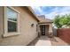 Welcoming front entry with stone accents on the columns and a brick walkway leading to the front door at 4323 E Wheaton St, Gilbert, AZ 85295