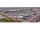Aerial view of local shopping center with ample parking, gas station and pedestrian walkways at 4323 E Wheaton St, Gilbert, AZ 85295
