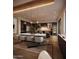 Elegant dining room featuring stylish lighting, a wine fridge, and modern decor at 4915 N Ascent Dr, Scottsdale, AZ 85251