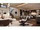 Open-concept living space with modern decor, a staircase, and ample natural light at 4915 N Ascent Dr, Scottsdale, AZ 85251