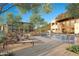 Inviting community pool area with comfortable lounge chairs and lush landscaping offering a resort-like experience at 4915 N Ascent Dr, Scottsdale, AZ 85251