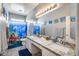 Bathroom features a granite countertop, dual sinks, and decorative shower curtain at 514 E Yvonne Ln, Tempe, AZ 85284