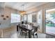 Dining room with large windows offering abundant natural light and neutral wall colors at 514 E Yvonne Ln, Tempe, AZ 85284