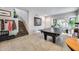 Game room offers pool table, view of entryway, and staircase to upper level at 514 E Yvonne Ln, Tempe, AZ 85284