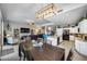 Open-concept living space with a dining area, kitchen, and comfortable seating at 514 E Yvonne Ln, Tempe, AZ 85284