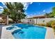 Stunning pool and hot tub combination with beautiful landscaping at 514 E Yvonne Ln, Tempe, AZ 85284