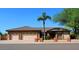 Charming single-story brick home with a three-car garage and manicured landscaping, creating great curb appeal at 6372 W Redfield Rd, Glendale, AZ 85306