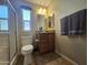 Bathroom features a granite countertop vanity and decorative tile floor at 650 N Hawes Rd # 4007, Mesa, AZ 85207