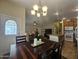 Inviting dining room with views into the living room and kitchen, creating an open, airy atmosphere at 650 N Hawes Rd # 4007, Mesa, AZ 85207