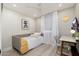 Cozy bedroom with a single bed, bright window, and modern decor at 6957 E Osborn Rd # A, Scottsdale, AZ 85251