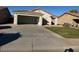 The home features an attached two-car garage, driveway, and lawn at 7232 W Zak Rd, Phoenix, AZ 85043