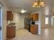 This kitchen features oak cabinets, stainless steel appliances, and tile flooring at 7232 W Zak Rd, Phoenix, AZ 85043