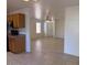 Open-concept living area seamlessly connects the kitchen to a spacious room at 7232 W Zak Rd, Phoenix, AZ 85043