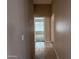 Hallway with access to the bedroom and living room at 7266 E Monte Ave, Mesa, AZ 85209