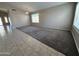 Spacious living room with vaulted ceiling and multiple windows at 7266 E Monte Ave, Mesa, AZ 85209