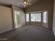 Spacious main bedroom with carpet and bay windows at 7266 E Monte Ave, Mesa, AZ 85209