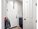 Welcoming entryway featuring neutral colors, modern accents, and convenient storage options at 7512 W Warner St, Phoenix, AZ 85043
