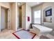 Modern bathroom with freestanding tub and separate tiled shower at 8024 W Vista Ave, Glendale, AZ 85303