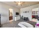 Bedroom with access to the bathroom and living area at 8024 W Vista Ave, Glendale, AZ 85303