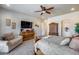 Spacious bedroom features fan, closet access and natural light at 8024 W Vista Ave, Glendale, AZ 85303