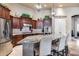 Gourmet kitchen with granite countertops, stainless appliances, ample storage, and a large island for casual dining at 8024 W Vista Ave, Glendale, AZ 85303