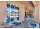 Covered patio area offering shade, outdoor seating, and serene backyard views for peaceful relaxation at 8024 W Vista Ave, Glendale, AZ 85303