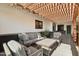 Comfortable outdoor patio with stylish seating and a pergola providing shade and architectural interest at 8730 E Montecito Ave, Scottsdale, AZ 85251