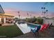 Inviting pool area featuring comfortable lounge chairs and desert landscaping, ideal for relaxation at 8730 E Montecito Ave, Scottsdale, AZ 85251