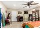 Bedroom featuring a ceiling fan, closet, and carpet at 930 E Friar Ave, Apache Junction, AZ 85119