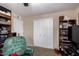 Bedroom with ceiling fan, closet, and carpet at 930 E Friar Ave, Apache Junction, AZ 85119