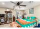 Spacious bedroom featuring a ceiling fan and carpet at 930 E Friar Ave, Apache Junction, AZ 85119