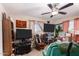 Bedroom with carpet, ceiling fan, and windows at 930 E Friar Ave, Apache Junction, AZ 85119