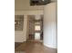 Entryway with tile flooring and column feature, offers a glimpse into living spaces at 9556 W Blue Sky Dr, Peoria, AZ 85383