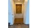 Hallway with tiled niche, connecting different areas of the home at 9556 W Blue Sky Dr, Peoria, AZ 85383