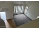Living room with tall ceilings, big windows and carpeted floors at 9556 W Blue Sky Dr, Peoria, AZ 85383