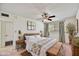Inviting bedroom with cozy decor, a ceiling fan, and natural light at 9635 W Ironwood Dr # B, Peoria, AZ 85345