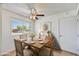 Cozy dining area with natural light and a decorative mirror at 9635 W Ironwood Dr # B, Peoria, AZ 85345