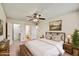 Bedroom with a ceiling fan and neutral decor at 9635 W Ironwood Dr # B, Peoria, AZ 85345