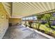 Open covered patio overlooking the landscaped backyard at 9635 W Ironwood Dr # B, Peoria, AZ 85345
