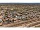 Gorgeous aerial view of desert community with houses surrounding the neighborhood streets at 10040 E Grandview St, Mesa, AZ 85207