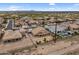 Aerial view of desert community showing layout of homes, properties, and neighborhood streets at 10040 E Grandview St, Mesa, AZ 85207