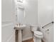 Powder room featuring a pedestal sink and tile floors at 10040 E Grandview St, Mesa, AZ 85207
