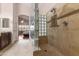 Luxurious walk-in shower and large vanity in a spacious primary ensuite bathroom at 10040 E Grandview St, Mesa, AZ 85207