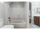 Bathroom featuring shower-tub combo with bronze fixtures at 10040 E Grandview St, Mesa, AZ 85207