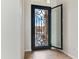 Entryway with decorative door, tile floors, and plenty of natural light at 10040 E Grandview St, Mesa, AZ 85207