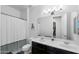 Well-appointed bathroom featuring double sinks and a shower-tub combination, blending practicality with modern design at 10714 E Lincoln Ave, Mesa, AZ 85212