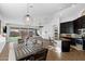 Open-concept living room with a view of the backyard and modern finishes at 10714 E Lincoln Ave, Mesa, AZ 85212