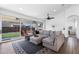 Spacious living area with a comfortable sectional sofa and backyard views at 10714 E Lincoln Ave, Mesa, AZ 85212